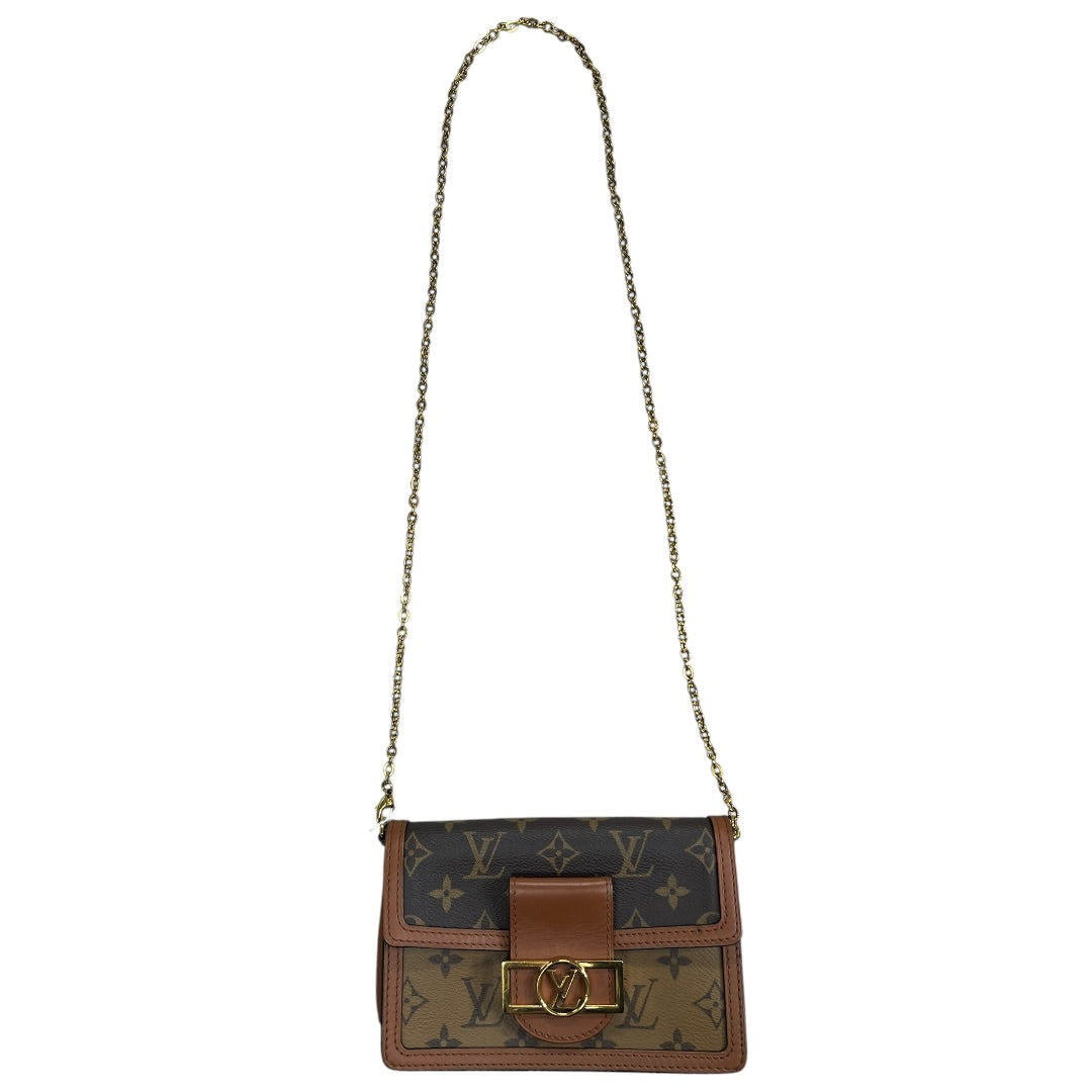 LOUIS VUITTON Monogram Reverse Dauphine Chain Wallet Brown Gold Hardware | Authentic Pre-Owned Luxury