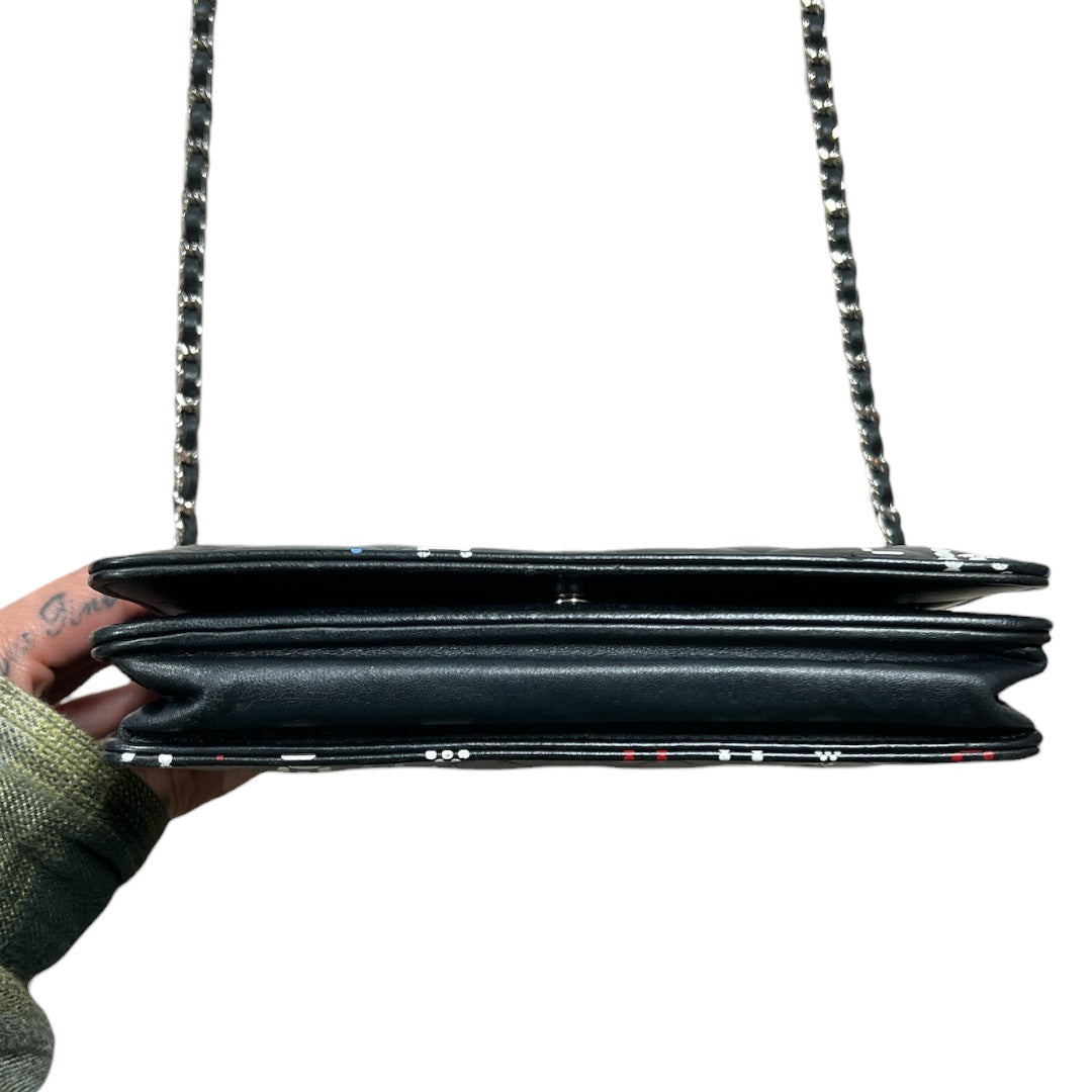 CHANEL Typography Print Chain Wallet WOC Quilted Leather Black | Authentic Pre-Owned Luxury
